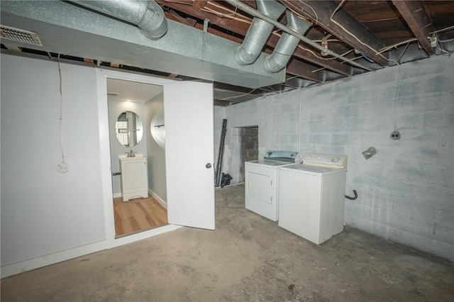 basement with separate washer and dryer