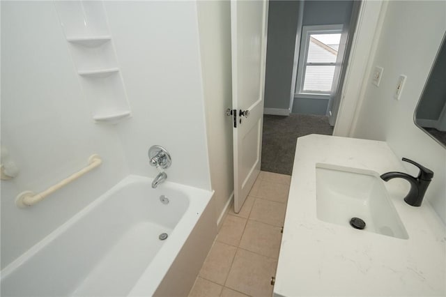 bathroom with tile patterned floors and vanity