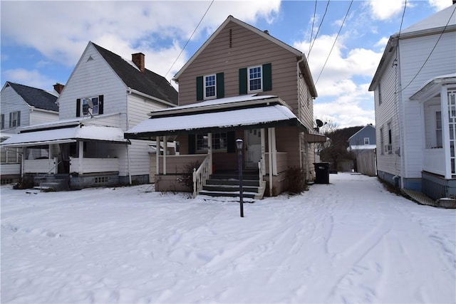 view of front of property featuring covered porch