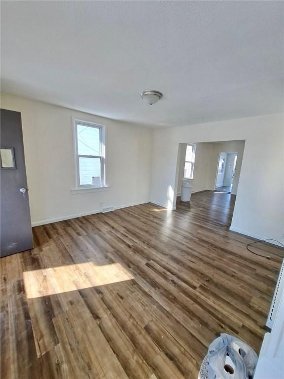 spare room with hardwood / wood-style floors