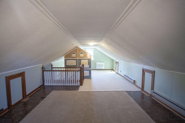 bonus room with carpet floors, baseboard heating, and lofted ceiling