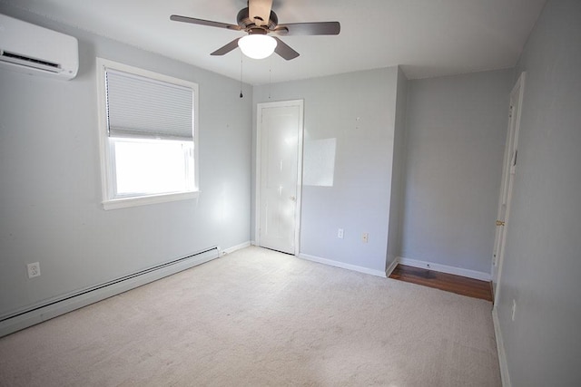 unfurnished bedroom featuring ceiling fan, a baseboard radiator, light carpet, and a wall mounted AC