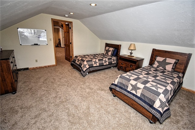 carpeted bedroom with a textured ceiling and lofted ceiling