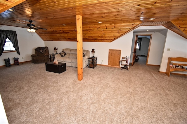 interior space featuring vaulted ceiling, ceiling fan, and wooden ceiling