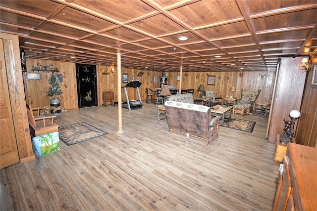 basement with wood ceiling and hardwood / wood-style flooring