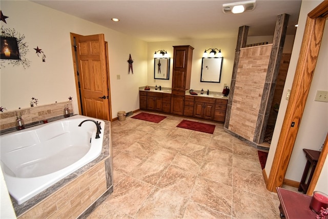 bathroom with separate shower and tub and vanity