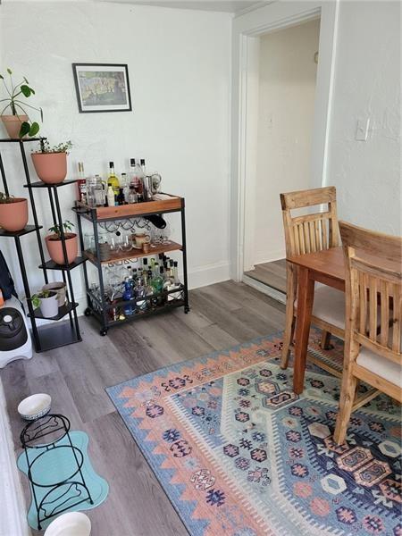 sitting room with hardwood / wood-style floors