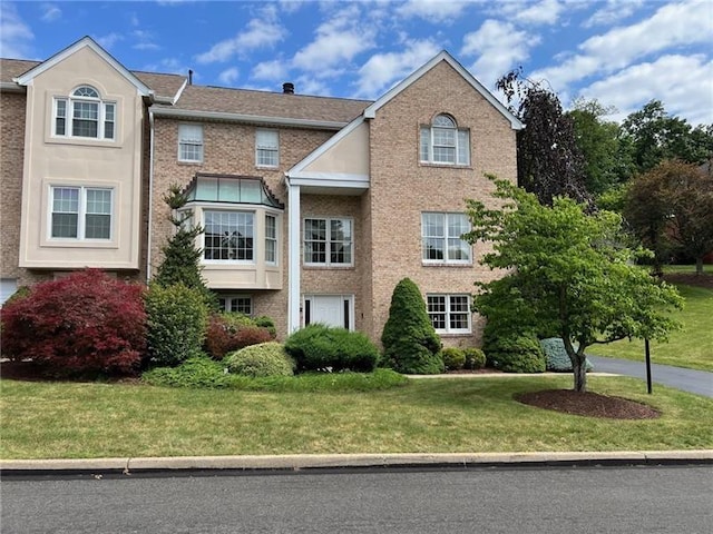 view of front of home with a front yard