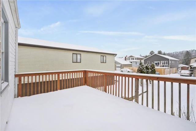 view of snow covered deck