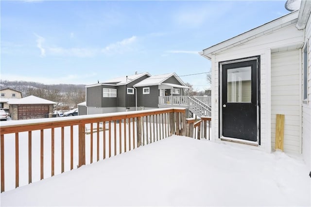 view of snow covered deck