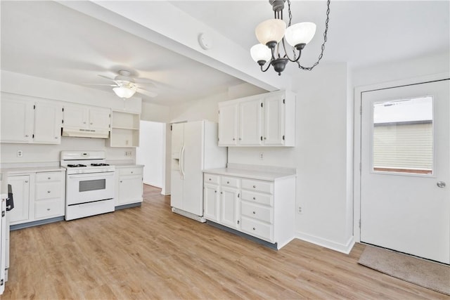 kitchen featuring white cabinetry, white appliances, ceiling fan with notable chandelier, and hanging light fixtures