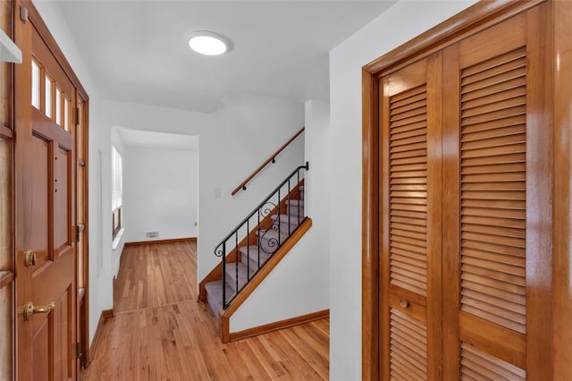 foyer with light wood-type flooring