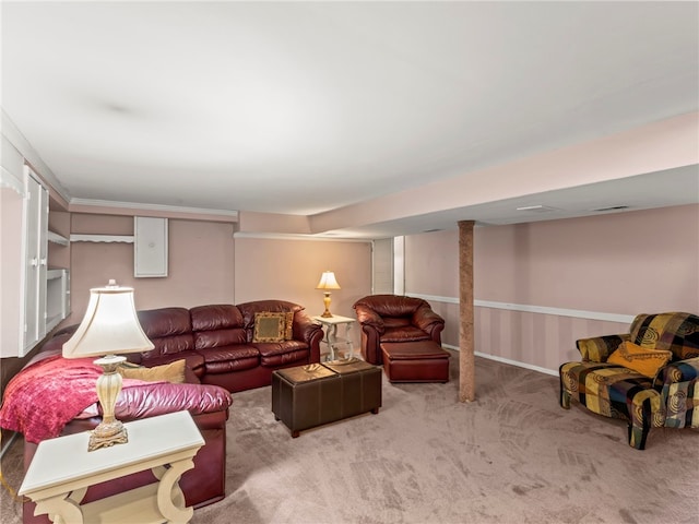 carpeted living room featuring ornamental molding