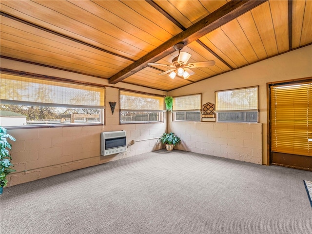 unfurnished sunroom featuring heating unit, vaulted ceiling with beams, ceiling fan, and wood ceiling