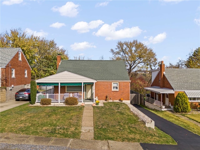 view of front of house featuring a front lawn and a porch