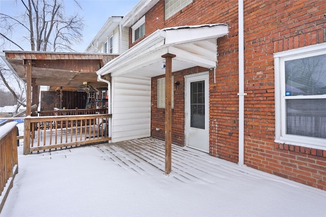 view of snow covered deck