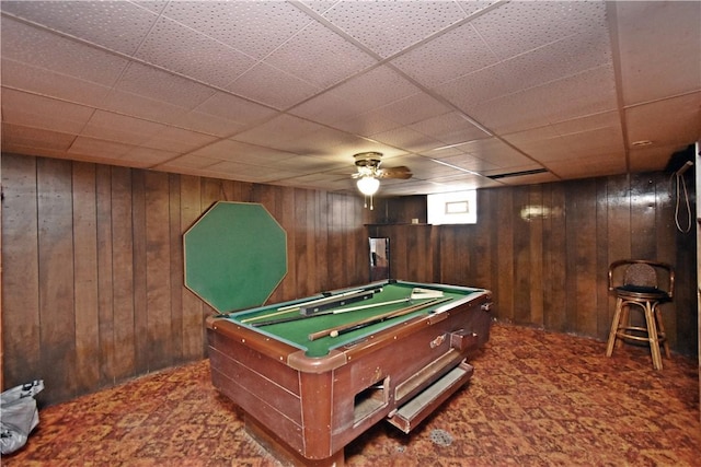 game room with billiards and wood walls