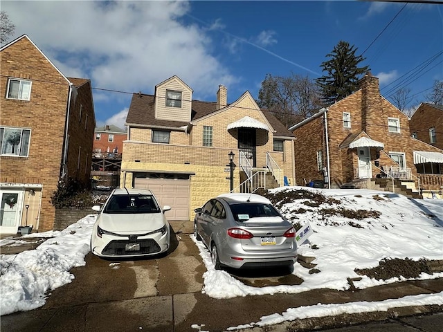 view of front of property with a garage