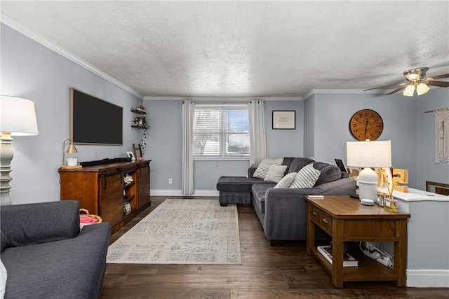 living room with a textured ceiling, ceiling fan, dark hardwood / wood-style flooring, and crown molding