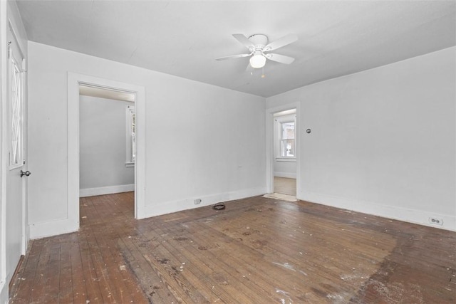 spare room featuring ceiling fan and wood-type flooring