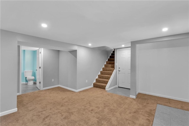 basement with light colored carpet