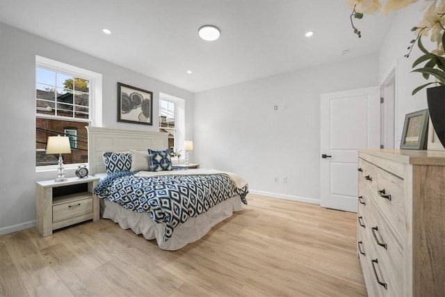 bedroom featuring light hardwood / wood-style floors