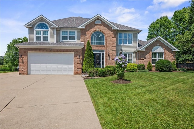 1004 Deveron Ct, Jeannette, PA 15644 - view of front of home featuring concrete driveway and brick siding