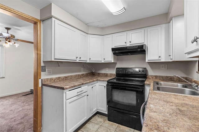 kitchen featuring ceiling fan, white cabinets, black range with electric stovetop, and sink