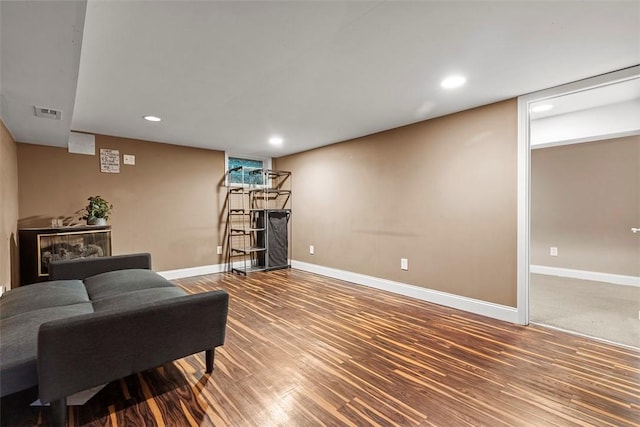 sitting room featuring hardwood / wood-style floors