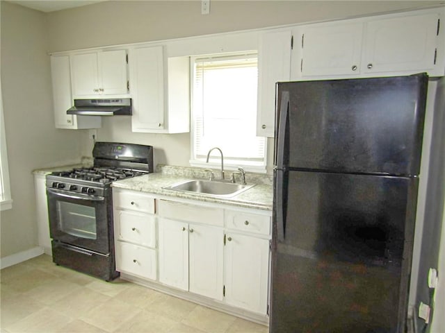 kitchen featuring white cabinetry, sink, and black appliances