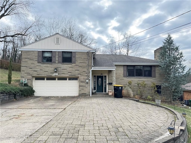 tri-level home featuring a garage