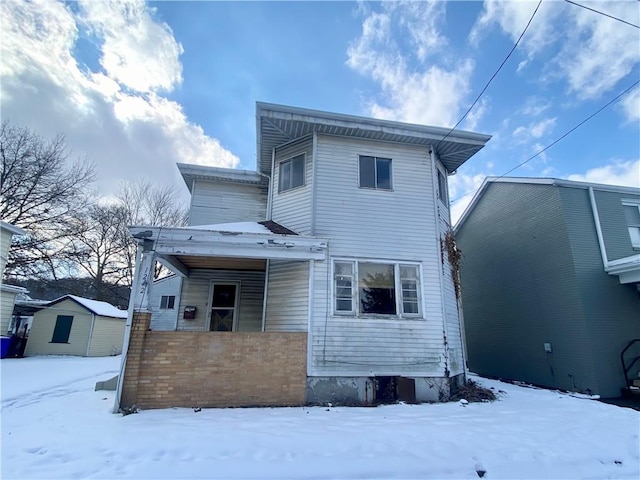 view of snow covered property