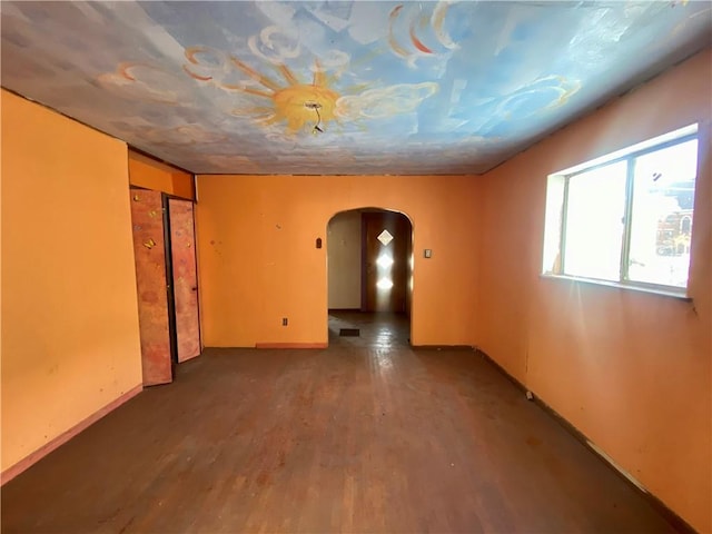 spare room featuring hardwood / wood-style floors