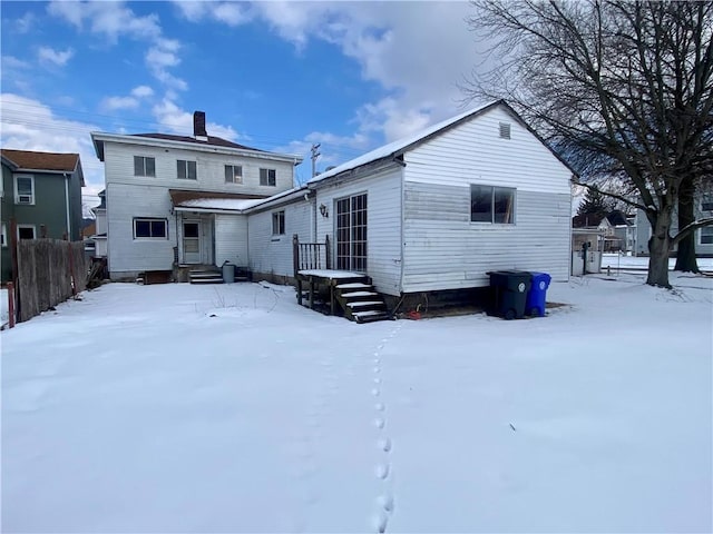 view of snow covered property