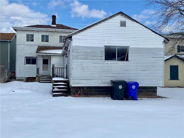 view of snow covered property