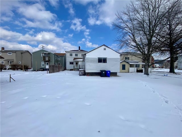 view of snow covered house