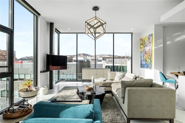 living room featuring light tile patterned flooring, floor to ceiling windows, and a notable chandelier