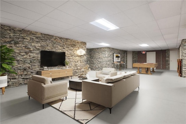 living room with a drop ceiling and pool table