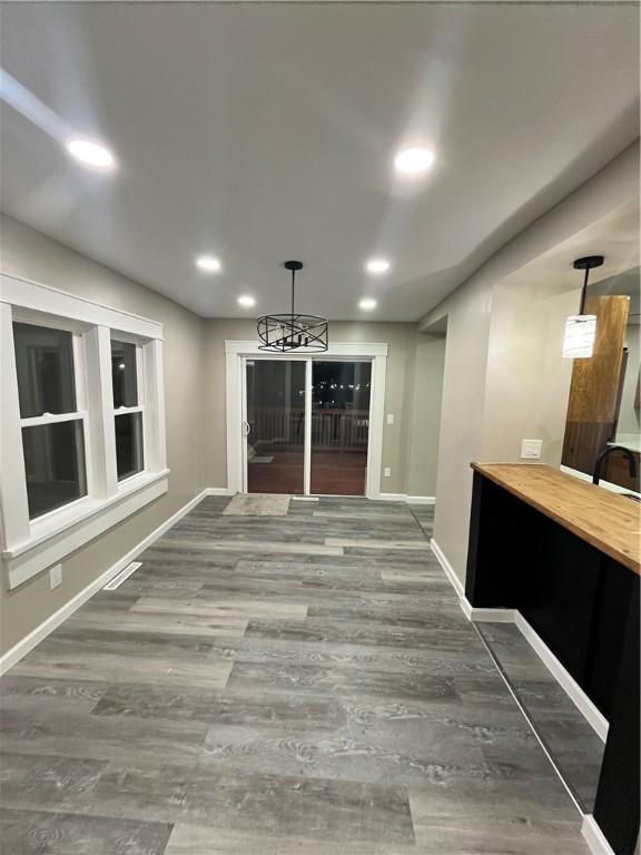 interior space featuring dark wood-type flooring