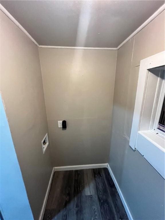 laundry room with wood finished floors, hookup for a washing machine, baseboards, hookup for an electric dryer, and crown molding