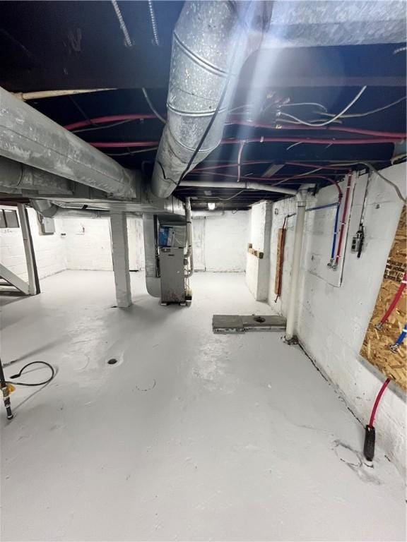 basement with heating unit