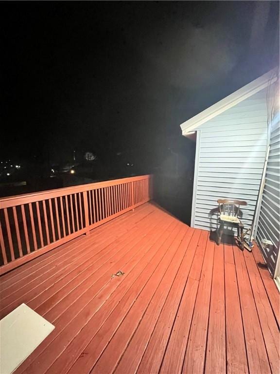 view of deck at twilight