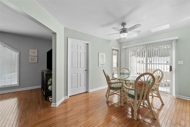 dining area featuring ceiling fan and hardwood / wood-style flooring