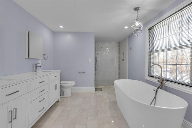 full bathroom featuring toilet, vanity, independent shower and bath, and a chandelier