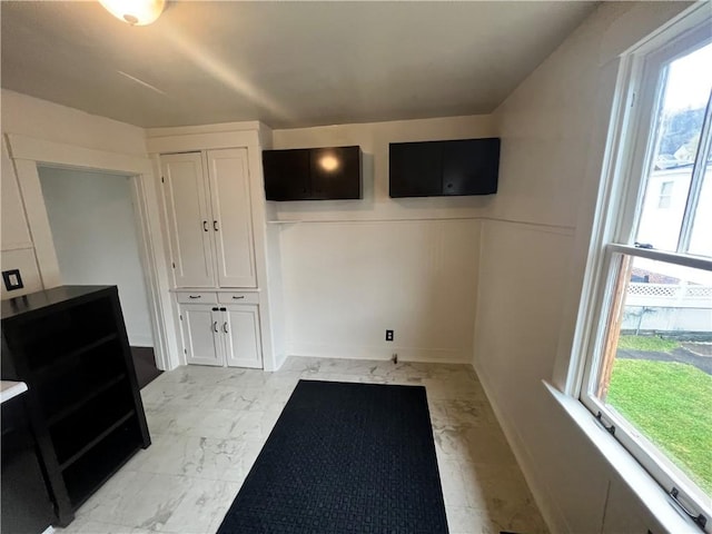 washroom with plenty of natural light