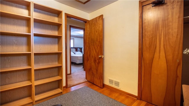 hallway featuring light wood-type flooring