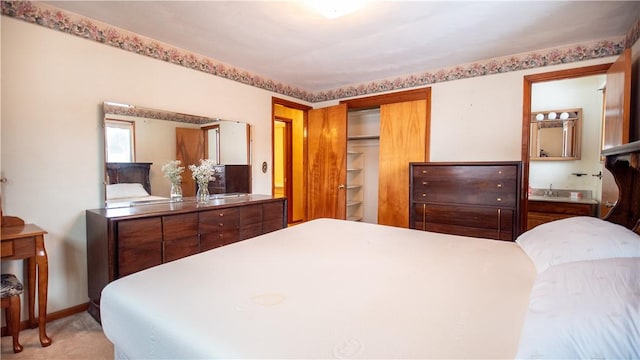 carpeted bedroom with a closet