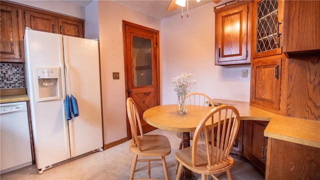 dining area with ceiling fan