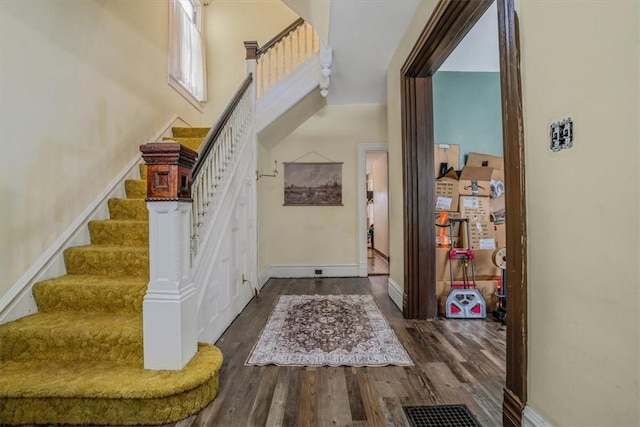 foyer featuring dark hardwood / wood-style floors