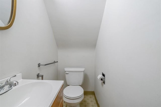 bathroom with toilet and sink